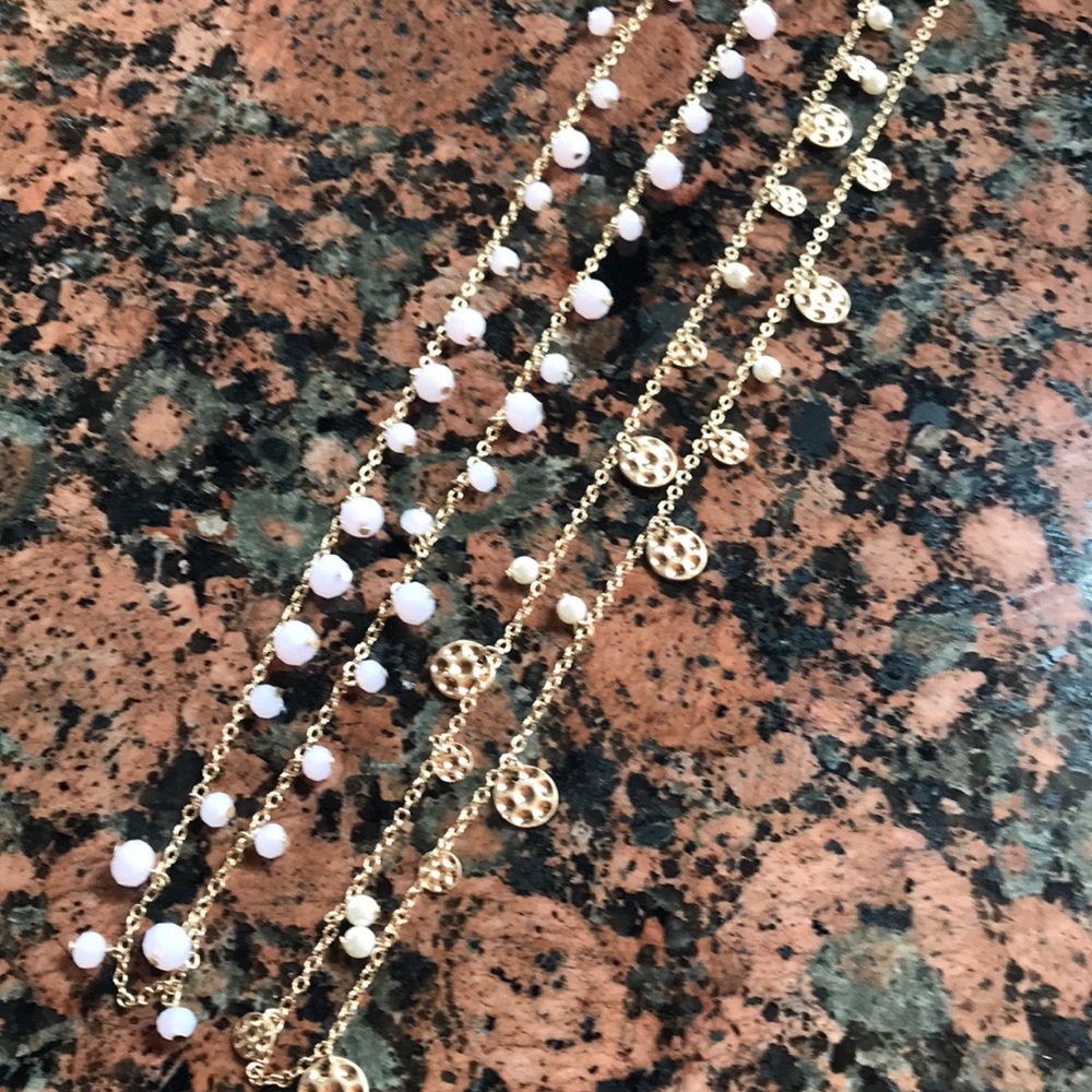 Two layering gold necklaces